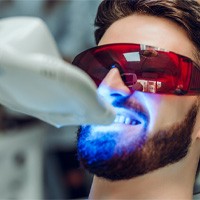  person getting their teeth whitened