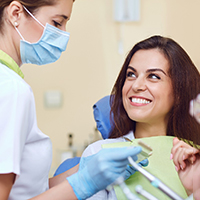 Patient smiling at Carlisle dentist during appointment