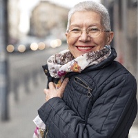 Woman smiling with dental bridge in Carlisle