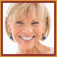 woman wearing earrings smiling
