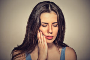 woman jaw dental pain 