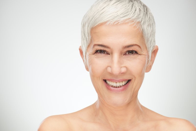 older woman smiling silver hair