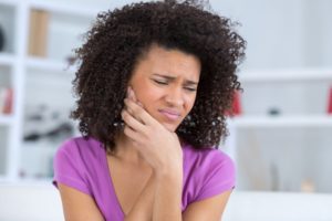 woman with tooth pain