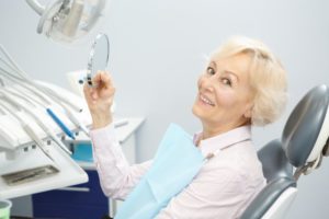 Woman enjoying her new dental implants