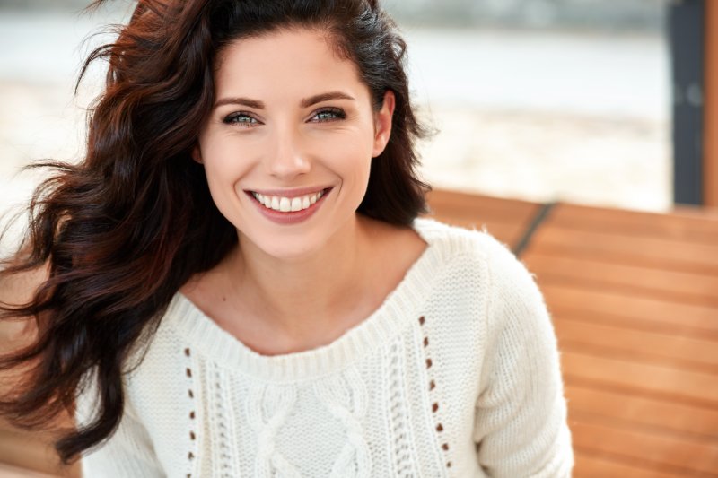 Woman smiling with straight, white teeth