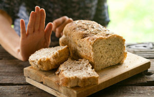 Person turning down bread