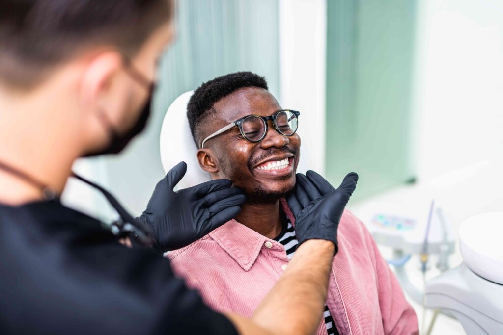 Man smiling at the dentist
