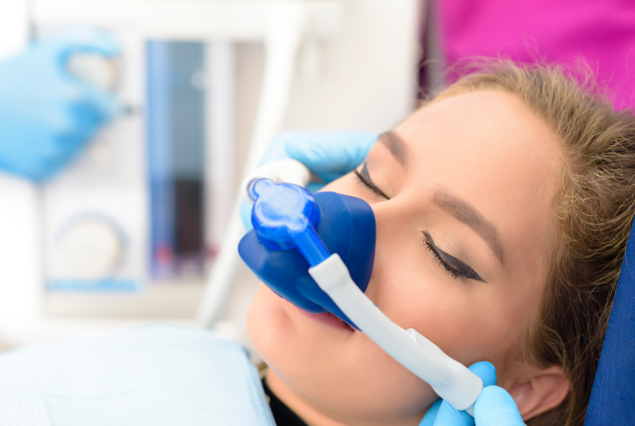 Woman undergoing sedation dentistry
